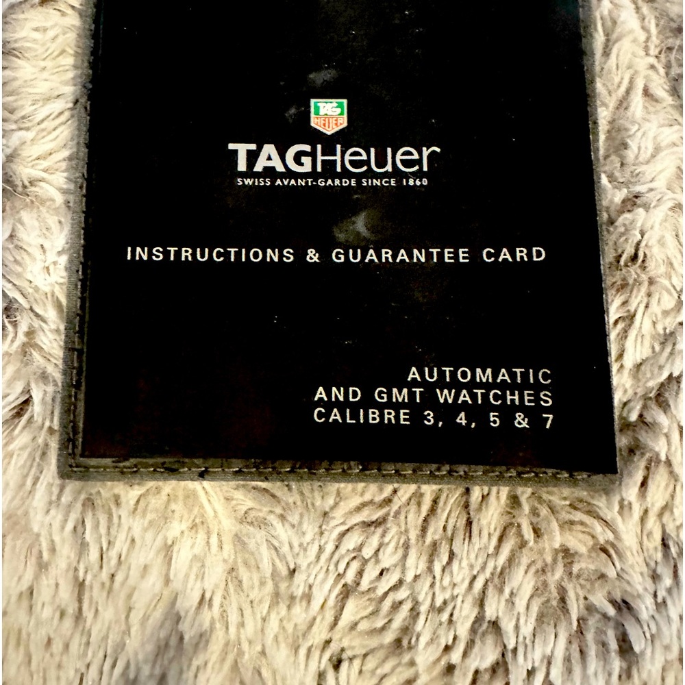 TAG Heaur Carrera ladies Automatic with diamond bezel and mother of pearl face.